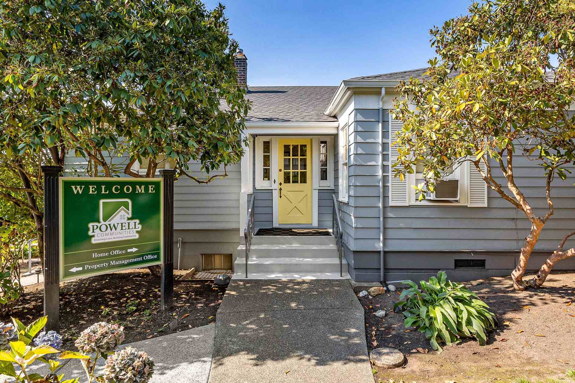 Powell Property Management Sidewalk Leading Up to Office