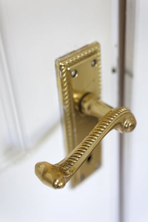 Interior door handle with lock